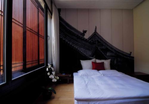 凝固的時間:錦宅特色酒店客房設(shè)計效果圖